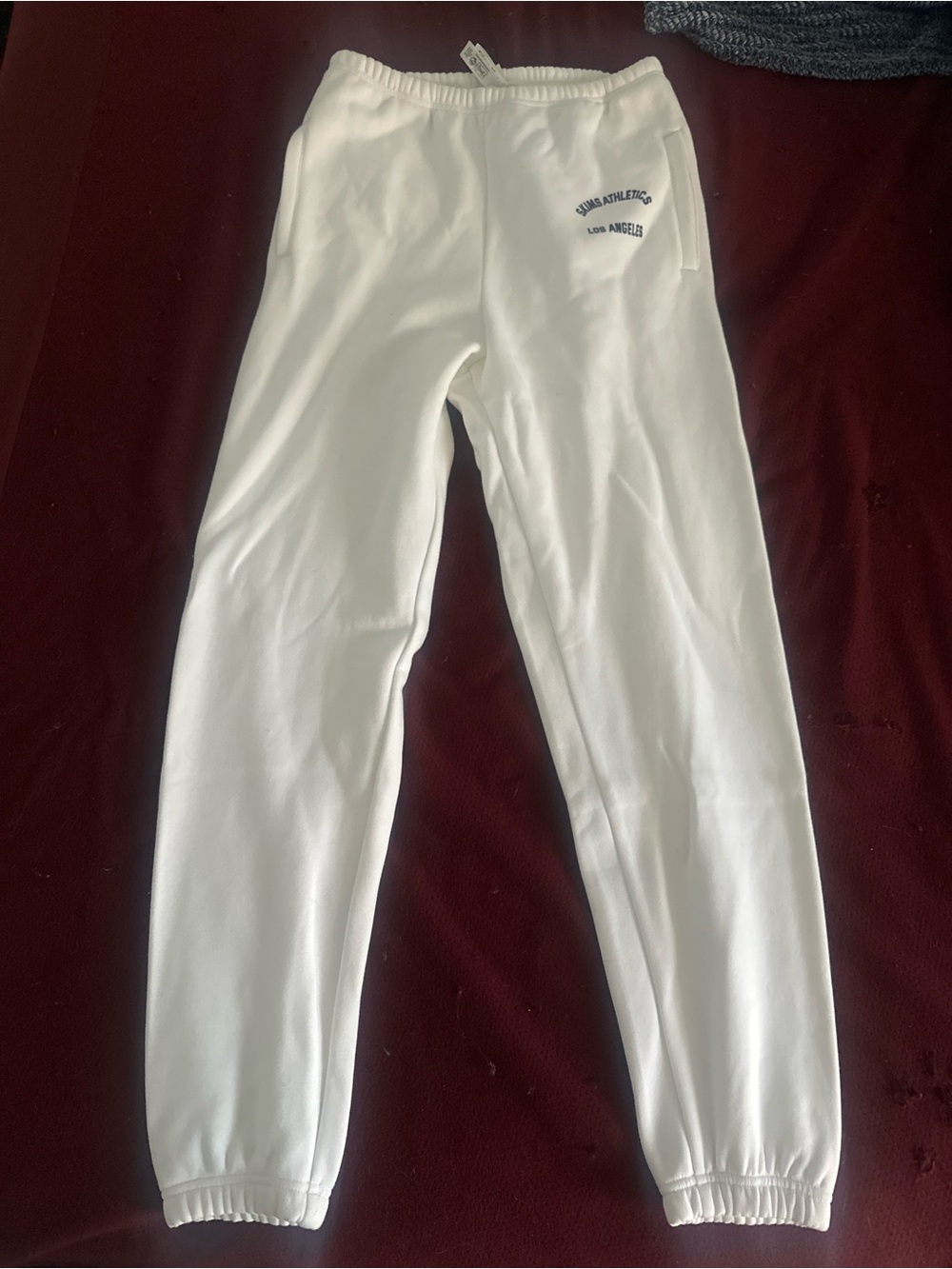 Skims athletics Los Angeles cuffed joggers in white